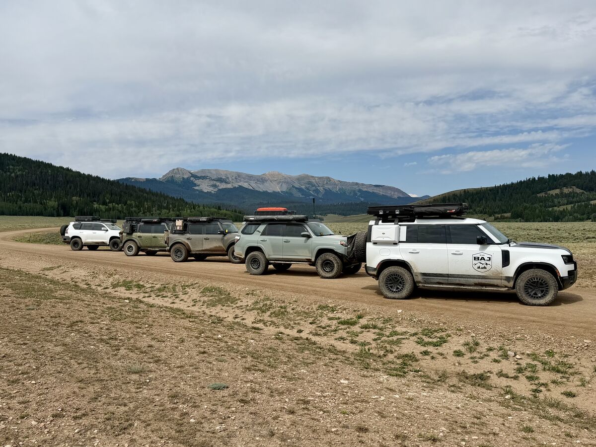 BAJ line of vehicles on the trail